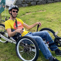 Wayne riding his Trike